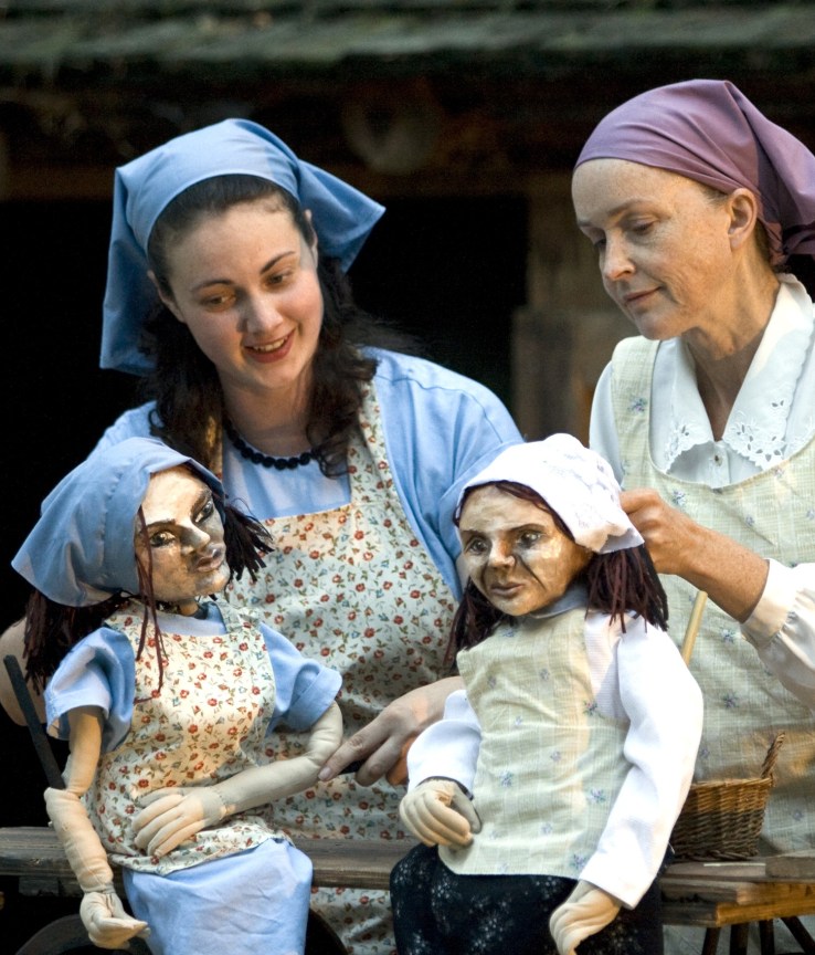 Victim Sara (l) with cast-mate Mameh (and some big people) in happier times